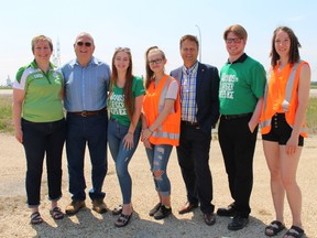 Manitoba's Agriculture Minister Ralph Eichler and Infrastructure Minister Ron Schuler with 4-H members, launch the annual 4-H Highway Clean Up Campaign at the Corner of Highway 6 and the Perimeter Highway on May 25. Juliet Kadzviti/Interlake Publishing/Postmedia Network