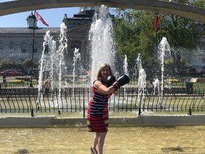 Kingston’s National Health and Fitness Day organizer Michelle Deschenes strikes a pose in Confederation Park, where the city’s inaugural event takes place on Saturday, June 2.