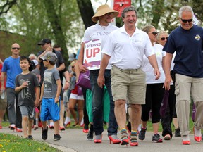 The first Walk a Mile in Her Shoes to help Women in Crisis (Algoma) drew more than 150 to Sault Ste. Marie's waterfront on Saturday.