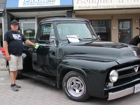 Wayne Nashkawa shines up his 1954 Ford before Saturday's Show and Shine in downtown North Bay.