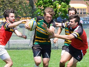 Centennial ballcarrier Carson Waite breaks through the Bayside Devils defence during an exciting Bay of Quinte senior boys rugby final Friday at MAS Park. Chargers won a close contest, 17-14. (Catharine Frost photo)