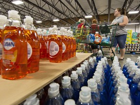 Products donated by local companies are sold at bargain prices at the 16th annual Brant United Way Giant Warehouse Sale on Saturday at Lions Park Arena in Brantford. (Brian Thompson/The Expositor)