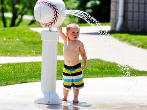 Jace Jefferson, 2, of Seaforth, made his second trip in as many days to the West Perth Lions Splash Pad last Friday, May 25, finding a way to cool off as hot, humid conditions suddenly arrived in the region. ANDY BADER/MITCHELL ADVOCATE