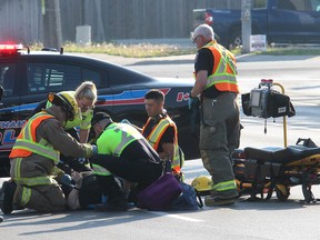 A female pedestrian in her early 60s was taken to hospital with life-threatening injuries after being struck by a vehicle around 8 a.m. on McNaughton Avenue West near St. Clair Street in Chatham, Ont. on Monday May 28, 2018. The Chatham-Kent police traffic management unit continues to investigate the incident, which prompted the scene to be closed to traffic until nearly 2 p.m. (Ellwood Shreve/Chatham Daily News/Postmedia Network)