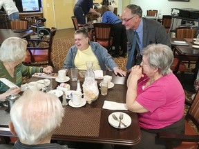 Progressive Conservative candidate Gary Bennett talks with residents at Kingsdale Chateau in Kingston, Ont. on Thursday, May 24, 2018. 
Elliot Ferguson/The Whig-Standard