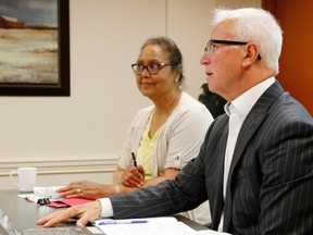 Luke Hendry/The Intelligencer 
South East LHIN chief executive officer Paul Huras speaks as chairwoman Hersh Sehdev listens during a board meeting Monday in Belleville. Huras said plans for a new hospital in Picton are likely to withstand any change in provincial government.