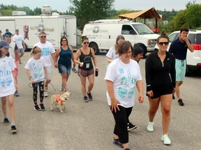 More than two dozen people came out for the cause at the 9th annual CarStar Walk for Cystic Fibrosis on Sunday, May 27. The walkers departed from Anicinabe Park on the seven kilometre route to Husky and Muskie and back to raise over $6,000 in pledges and donations for the national campaign to find a cure.
Reg Clayton/Daily Miner and News