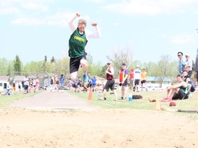 Calvin Dyck of MUCC competed in the senior boys’ triple jump at the NESSAC Track and Field competition at MUCC Field on Wednesday, March 23.