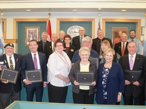 St. Clair Township council presented grants to five groups prior to council's May 22 meeting, money allocated during the township's 2018 budget. Front row (left to right): Royal Canadian Legion Br. 18's Mike Hindmarsh and Len Drouillard, Lambton College Foundation's Marc Guilbeault, Central Family Health Team's Mary-Pat Gleeson and Roseanne Orcutt, Moore Presbyterian Foundation's Bob McClemens, Moore Agricultural Society's Michelle Evanitski, Lambton College's Margaret Dragan, Moore Agricultural Society's Malcolm Rogers, and Mayor Steve Arnold.
CARL HNATYSHYN/SARNIA THIS WEEK