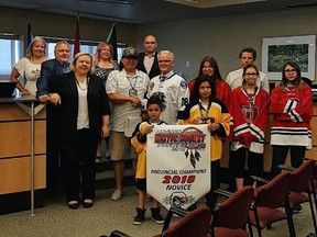 Members of the Bantam and Novice Defenders accept their certificate of outstanding achievement from City of Spruce Grove Council.