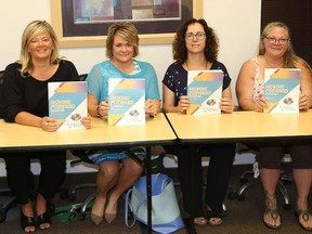 TIM MEEKS/THE INTELLIGENCER
Poverty Roundtable Hastings Prince Edward released its Moving Forward report Tuesday at the Community Development Council of Quinte office on Station Street. Pictured from the left are: Christine Durant, Director of the Poverty RoundTable, Brandi Hodge, Director of Community Engagement for United Way Hastings & Prince Edward, Christanne Lewis, Director of Programs and Services for the Belleville and Quinte West Community Health Centre, Deirdre McDade, Co-Director Legal Services at the Community Advocacy and Legal Centre,Tami Downes, VP of CanGrands National Kinship Support Group and a member of the Poverty Roundtable steering committee, and CDC Quinte Executive Director Ruth Ingersoll.