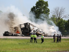 Emergency services on the scene of a tractor trailer crash and fire in the westbound lanes of Highway 401 near Tyendinaga.  Meghan Balogh, Kingston Whig-Standard, Postmedia Network