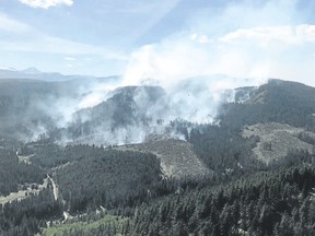 An aerial photo showing the Champion Lakes Fire, near Bragg Creek, on Sunday