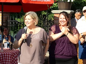 Provincial NDP Leader Andrea Horwath speaks to supporters at Mamma Maria's in Chatham on Tuesday evening, as Chatham-Kent-Leamington NDP candidate Jordan McGrail looks on. Trevor Terfloth/Postmedia Network