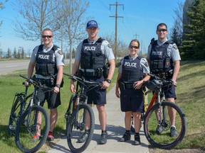 Constables Patrick Koch, Daniel Martin, Erika McGrattan and Corporal Glenn Odishaw announce the launch of RCMP summer bike patrol.