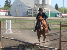 Natalie Nikiforuk competing in the All English Season Opener held at J.E. Hawker Pavilion outdoors arena at GPRC Fairview over the Victoria Day long weekend