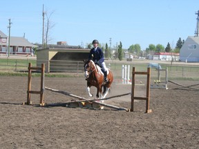 CHRIS EAKIN/POSTMEDIA NETWORK
Cora Lutz of Peace River on Raina, competes in the annual all-english Spring Opener Horse Show, held by the Fairview Sport Horse Society, on May 20 in the outdoor ring of J.E. Hawker Pavilion at GPRC Fairview College Campus.