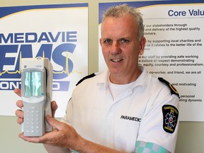 Rodney Hetherington, operations manager, Chatham-Kent Medavie EMS, displays a handheld blood analysis device that members of the community paramedic team will soon be using in the field. Photo taken in Chatham, Ont. on Wednesday May 30, 2018. Ellwood Shreve/Chatham Daily News/Postmedia Network