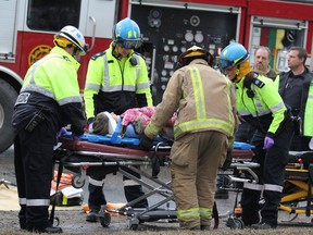 Paramedics and firefighters respond to a collision at Goulais Avenue and Second Line West in March 2016.