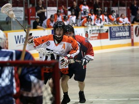 NorthStars assistant captain Spencer Elder drives by Guelph Regals defender Tyler Dunk in the second period of Owen Sound's 10-6 victory at the Harry Lumley Bayshore Community Centre on Wednesday night. Greg Cowan/The Sun Times