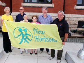 New Horizons Seniors Centre president Ruth Bowiec (centre) with board members Alice Jardine (left) and Phyllis Lockhart are joined by Councillors Rory McMillan, Mort Goss and Dan Reynard for the June is Seniors Month flag raising at City Hall, Wednesday, May 30.
Reg Clayton/for The Enterprise