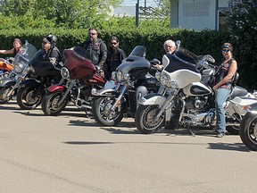 Members of Bikers Against Child Abuse visited the Alberta Provincial Courthouse in Hanna, Alta. on May 28 to stand in solidarity with a young victim of child abuse. BACA provides support to those who have suffered abuse at the hands of adults.