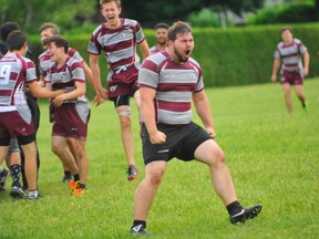 Holy Trinity's Aleq Perreault celebrates his team's CWOSSA A/AA rugby victory in Waterford on Thursday. The Titans beat Paris 17-12 in overtime to claim their first Central West crown in school history.
JACOB ROBINSON/Simcoe Reformer