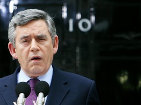 STRINGER/AFP/Getty Images
British Prime Minister Gordon Brown addresses the media outside of 10 Downing Street in central London on May 10, 2010.