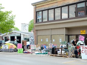 This was the protesters' encampment in front of the former VLC homeless shelter at its height. It is all but removed now to comply with a city bylaw notice. Monday the first-mortgage holder issued a trespass notice to anyone affiliated with the VLC. (Scott Dunn/The Sun Times)