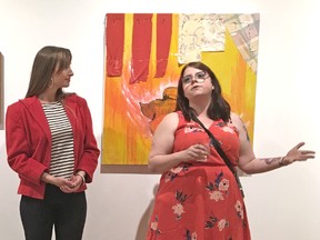 Gallery manager Alex Richardson, left, and artist Jackie Carter thank a large crowd at the reception for Carter’s solo exhibition, The Moulting Period, at the WKP Kennedy Gallery last Friday.
Photo by Vanessa Tignanelli