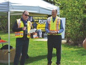 Mayor Bob Young (right) and Director of Engineering Shawn Olson (left) announced the launch of a new capital projects website which will keep residents up to date on all construction projects happening in the city. (Lisa Berg/Rep Staff)