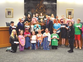 Grade 6 students from Linsford Park School worked with city officials to participate in a mock city council on May 25. Linsford Park is one of 12 schools to do mock councils this year. (Lisa Berg/Rep Staff)