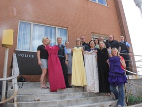Members of the Stratford Police Service show some of the dresses they have been able to collect as part of a new local initiative called the Stratford Glam Exchange. The goal is to collect prom dresses and formal wear and then donate them to those who may need them. (JONATHAN JUHA, Beacon Herald)