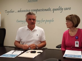 Chatham-Kent Health Alliance board chair Greg Aarssen speaks alongside president and CEO Lori Marshall on Friday. (Trevor Terfloth/The Daily News)