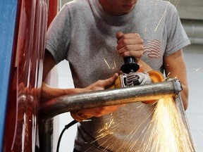 Grade 12 Northwestern student Grant Van Dam works in the welding room on Friday, June 1, 2018 in Stratford, Ont. (Terry Bridge/Stratford Beacon Herald)