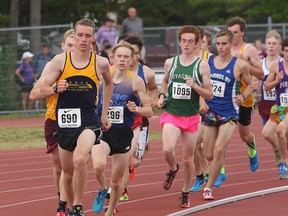 Carter Free of Napanee District Secondary School takes the lead on his way to winning the senior boys 1,500 race during the East Regional Track & Field Meet at Caraco Home Field in Kingston on Thursday May 31 2018. Ian MacAlpine/The Whig-Standard/Postmedia Network