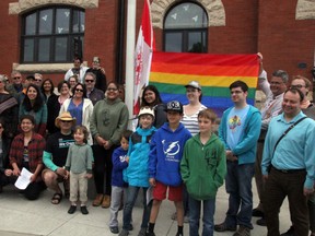 June is Pride month and for the first time the rainbow coloured flag will fly at Kenora city hall throughout the month of June. A handful of city councilors were on hand along with members of SPACE where members of the LGBTQ2S+ community gather and Ontario NDP candidate Glen Archer (back right holding the flag) to celebrate inclusiveness. Pride week is June 22-29. SHERI LAMB/Daily Miner and News/Postmedia Network