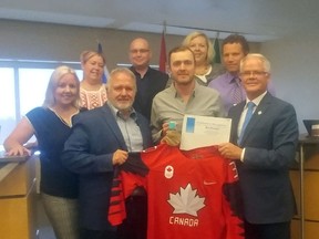 Ben Scrivens presented City of Spruce Grove Council with a Team Canada jersey, commemorating his time at the 2018 Pyeongchang Olympics.