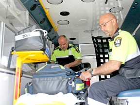 Veteran paramedics Mark Beaulieu and Richard Lebeau check an ambulance's supplies. Paramedics were recognized this week during National Paramedic Services Week for keeping their communities safe 24 hours a day seven days a week.
Jennifer Hamilton-McCharles / The Nugget
