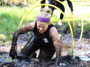 Micheline Cyr made her way through the mud crawl obstacle during Mud Factor 2018 at Porcupine Ski Runners on Saturday, June 2. The fundraiser is held by the Alzheimer Society of Timmins-Porcupine and featured 200 participants in 15 obstacles.