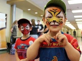From right, Jacob Bourget, 3, and Jarred Bourget, 5, had their faces painted during the Pyramid Recreation Centre’s 10th anniversary celebration on Saturday, June 2, 2018 in St. Marys, Ont. Terry Bridge/Stratford Beacon Herald/Postmedia Network
