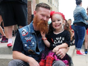 John Cronk and his three-year-old daughter Arya get ready for the 8th annual Heels to Heal event on Sunday in Harmony Square. The goal was to raise $25,000 for Nova Vita Domestic Violence Prevention Services in Brantford. Michelle Ruby/The Expositor