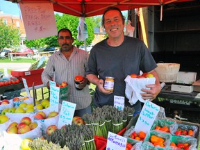 Gonzalo Oria Perea and John Alderson of Alderbrook  Farm in Wilsonville take part in the weekly Waterford Farmers Market. Jacob Robinson/Simcoe Reforrmer