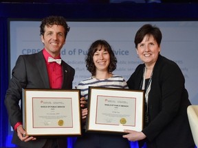 PHOTO COURTESY CNW GROUP
Tim Conrad, APR and Emily Epp accepting the 2018 CPRS Sheild of Public Service from CPRS National President Dana Dean, APR, FCPRS LM