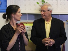 Nipissing PC candidate Vic Fedeli chats with Bow Meow Pet Care Centre owner Melissa St. Jules, Monday, in the lead-up to the Thursday provincial election.
PJ Wilson/The Nugget