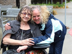 Driving Miss Daisy client Colleen (left) welcomes an embrace from Laurette Phimester, the franchise owner in Sherwood Park, following a trip to the doctor. The two have become best friends since Colleen started using the service a couple years ago.

Zach Mueller/News Staff