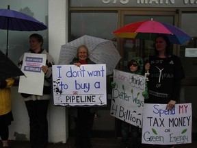 Protesters gathered outside Nipissing-Timiskaming MP Anthony Rota's office Monday to opposed the federal government's purchase of the Trans Mountain pipeline.