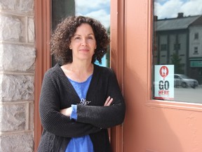 Coun. Kathy Vassilakos stands next to a Go Here decal that identifies City Hall as a location with washrooms accessible to the public. Vassilakos spearheaded a project that saw the city partnering with Crohn’s and Colitis Canada for its Go Here Washroom Access Program. JONATHAN JUHA/THE BEACON HERALD/POSTMEDIA NETWORK