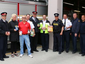 The annual emergency responders' food drive takes place this Sunday from noon through to 4 p.m. in every neighbourhood in Timmins. Firefighters, police and paramedics all gathered at the Timmins fire hall this week to reveal they are all working together to respond to the urgent need to restock the shelves of the South Porcupine and Timmins food banks.  City residents are urged to listen for the sirens in their neighbourhood and to bring their food donations out to their end of the driveways.