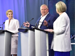 Party leaders, left to right, Kathleen Wynne Doug Ford and Andrea Horwath participate during the third and final televised debate of the campaign in Toronto on May 27. Frank Gunn / THE CANADIAN PRESS